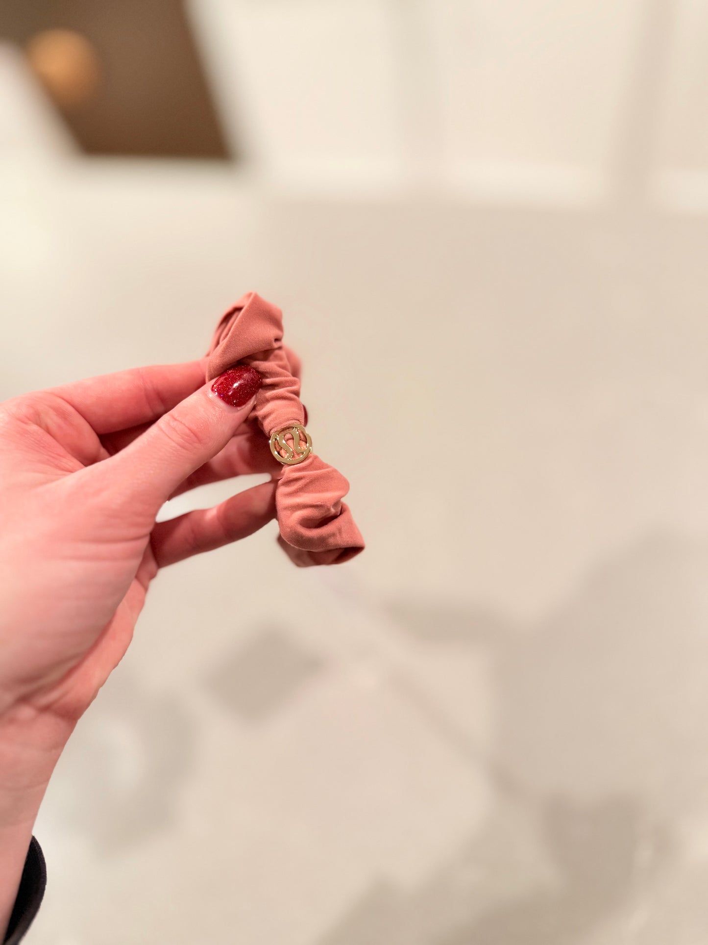 Uplifting scrunchie logo charm