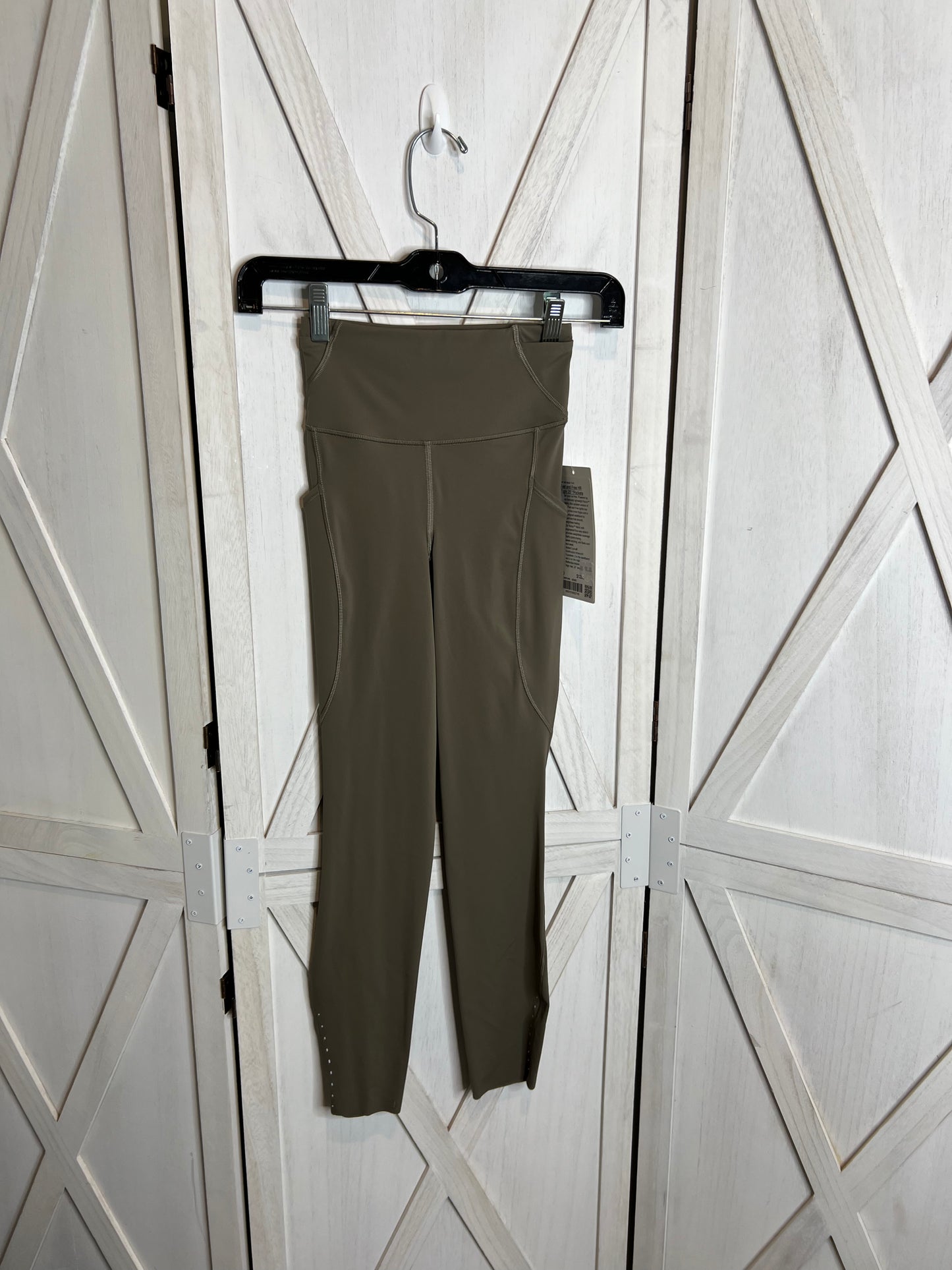 Fast and free HR tight 25” *pockets *SIZE 0