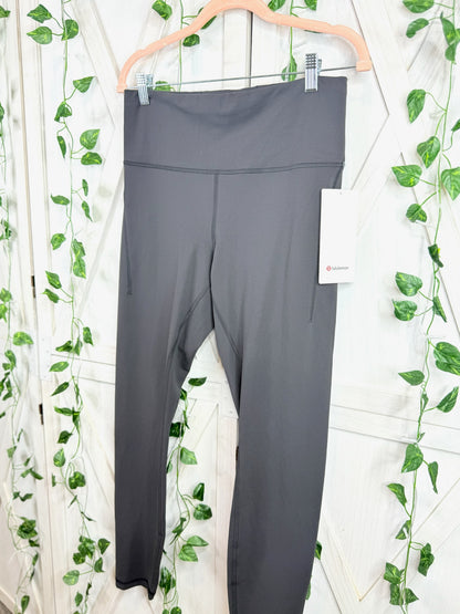 Wunder Train HR Tight 28” *Pockets * Size 12