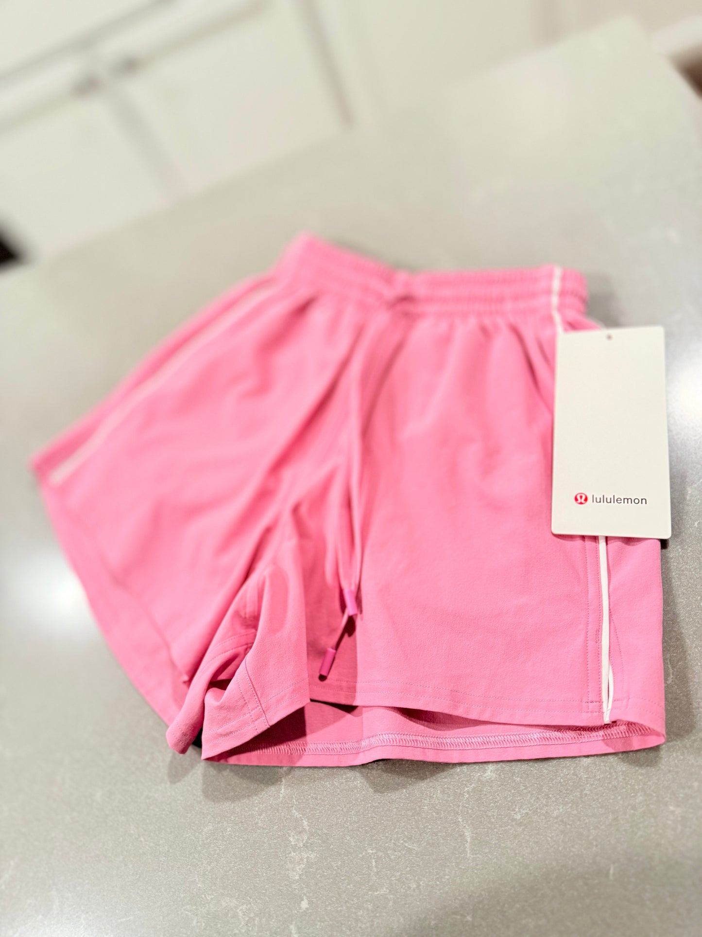 Court rival hr short 3” Size 0