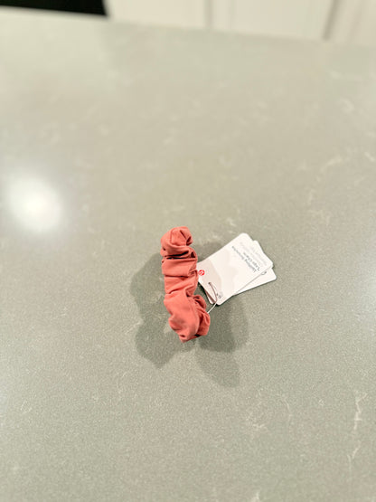 Uplifting scrunchie logo charm