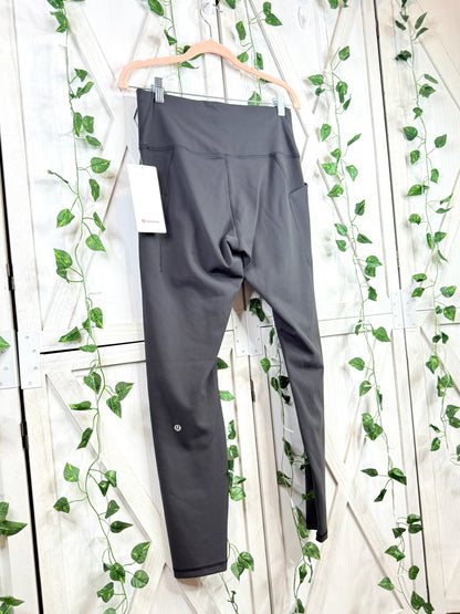 Wunder Train HR Tight 28” *Pockets * Size 12