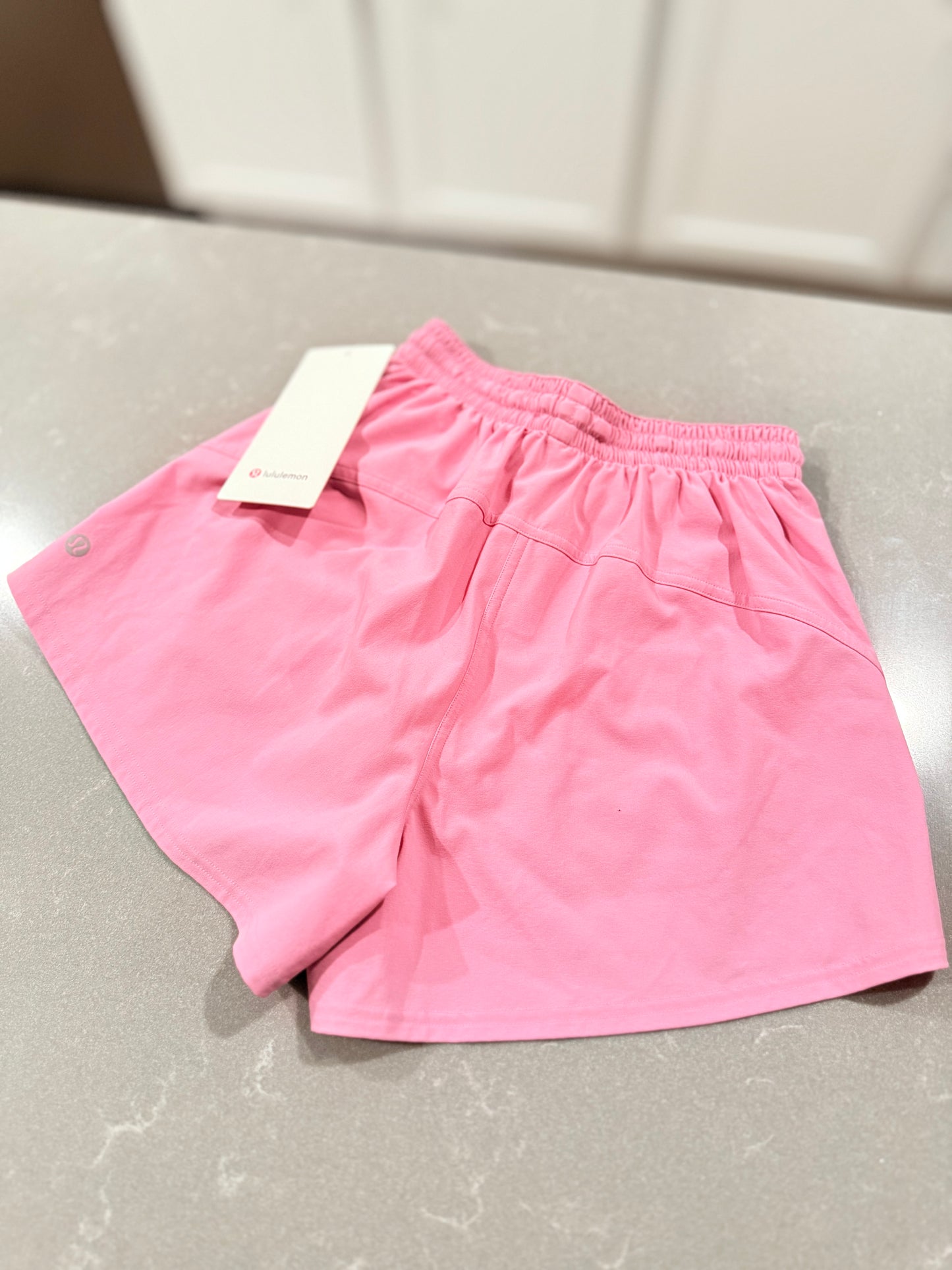 Court rival hr short 3” Size 0
