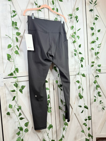 Wunder Train HR Tight 28” *Pockets * Size 12