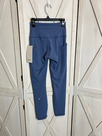 wunder train HR tight 25” *pockets*SIZE 4