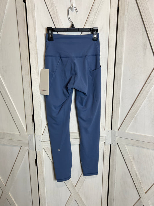 wunder train HR tight 25” *pockets*SIZE 4